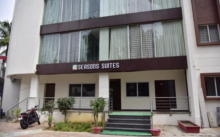 SEASONS SUITES