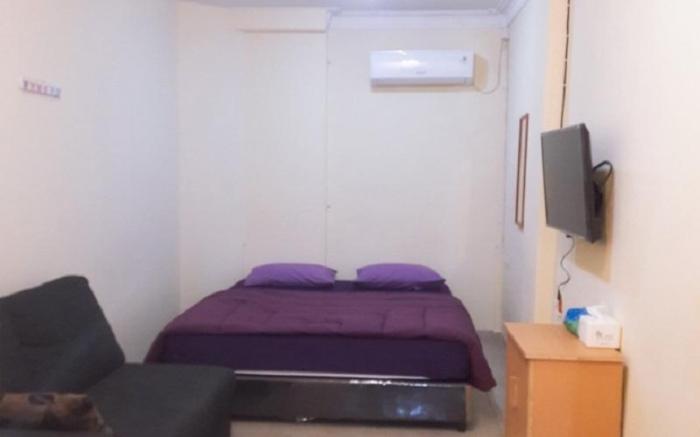Jakson Homestay Batam - DELUXE with SOFA ROOM I