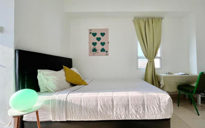 Sun-Kissed, Breezy Studio with a Green Glow