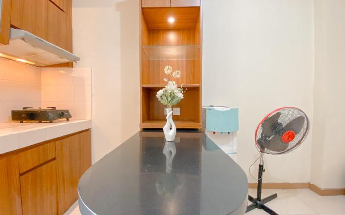 Good Homey 2BR at Green Palm Residence By Travelio