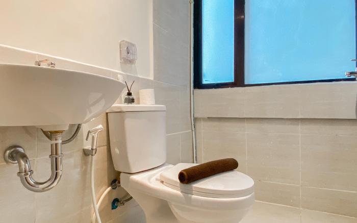 Relaxing Cozy Living 2BR Meikarta Apt By Travelio