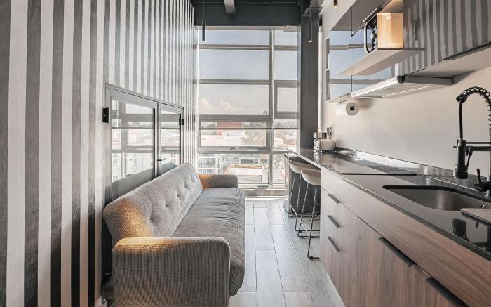 The Striped Loft Modern Elegance in  centric place