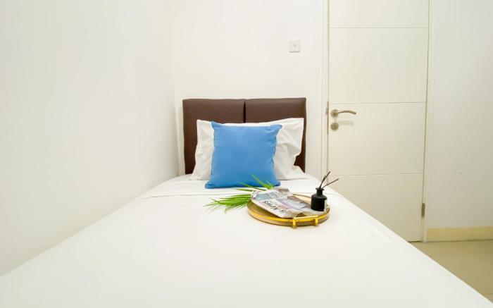 Relaxing and Homey 2BR at Bassura City By Travelio
