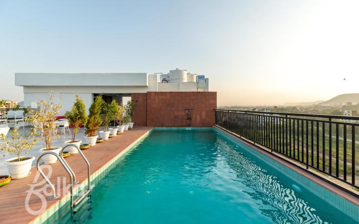 Hotel De Glance - Udaipuri Restaurant I Terrace Swimming pool I Banquet