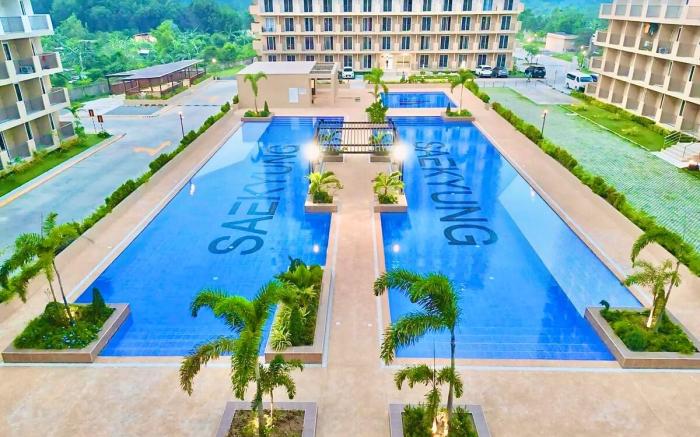 Cozy Condo near Airport, with Pool & Sea View