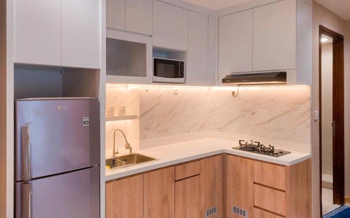 Nice and Modern 2BR M-Town Signature By Travelio