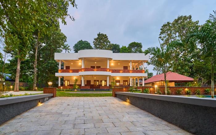 VOYE HOMES Signature Pool Resort Varkala