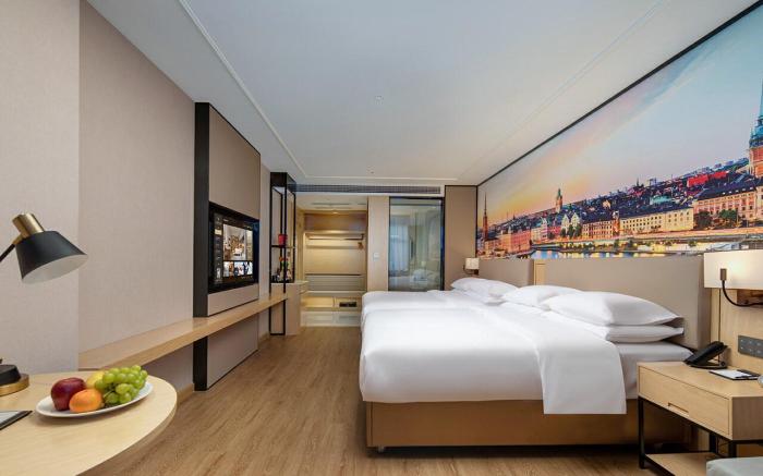 Vienna International Hotel QuzhouShuitingmen Guojin Center