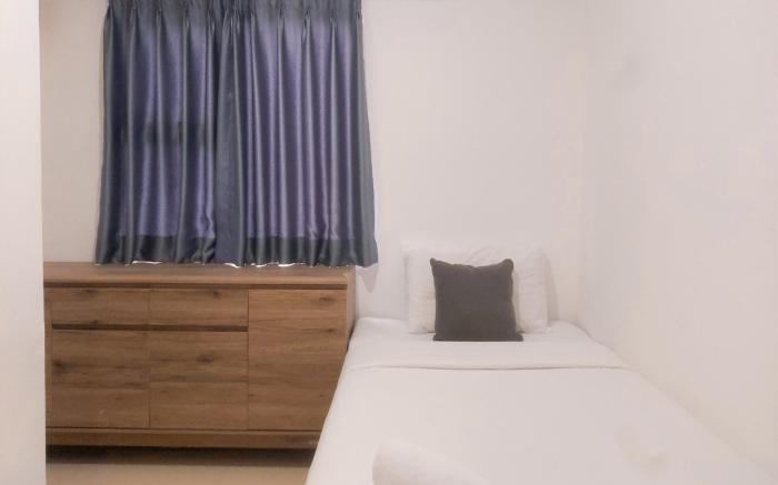 Simply Homey 2BR Urbantown Serpong Apt by Travelio