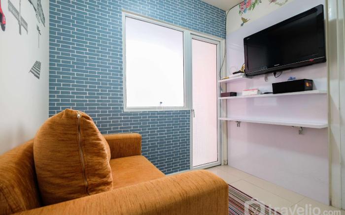 Apt 2BR Pool View Green Pramuka City By Travelio