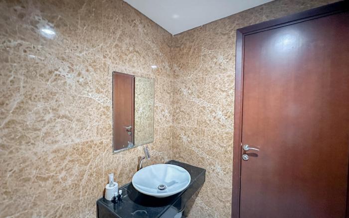Strategic 1BR at Grand Sungkono Lagoon By Travelio