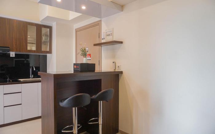 Warm and Modern Style 2BR Meikarta Apt By Travelio