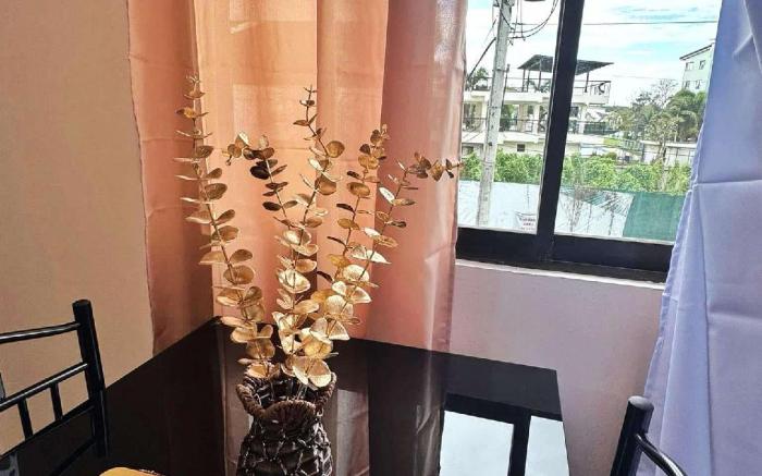 LUNA STAYCATION Cozy Condo near Enchanted Kingdom