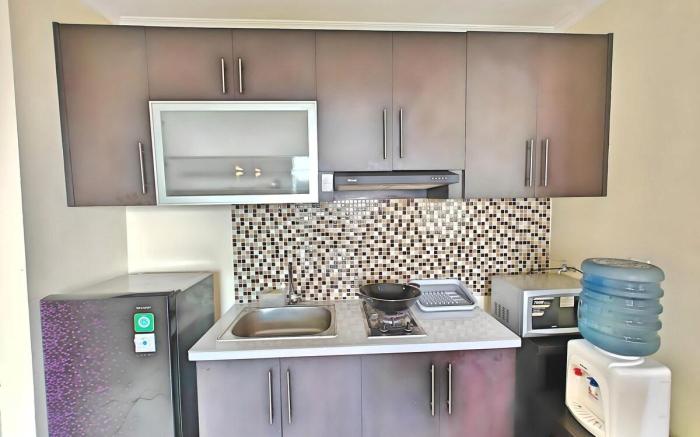 Strategic 2BR Gading MOI Apt w/ Wi-Fi, Pool & Gym
