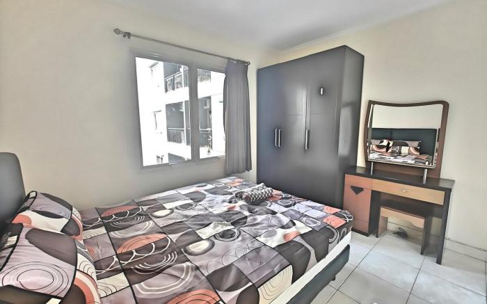 Strategic 2BR Gading MOI Apt w/ Wi-Fi, Pool & Gym