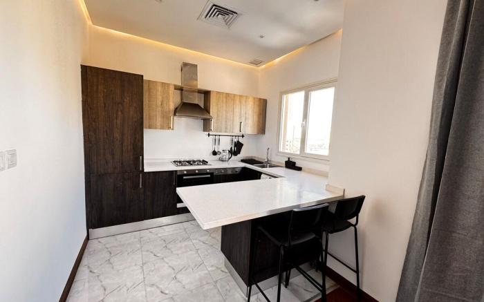 Cozy One-Bedroom Elegant Apartment in Salmiya 12