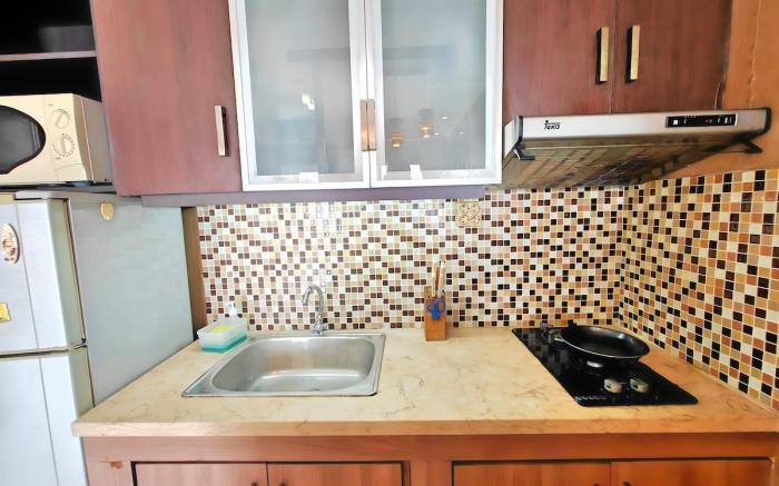Strategic 3BR Sudirman Park Apt w/ Wi-Fi, Pool,Gym