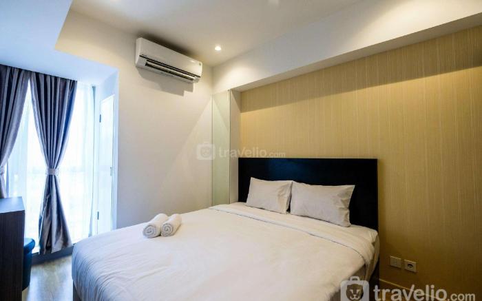 Elegant 1BR Branz BSD Apt near AEON By Travelio