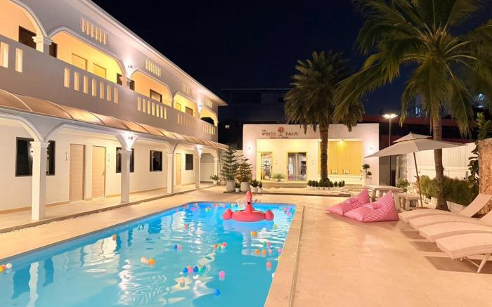 The ​White ​Palm ​Villa​ & Pool​