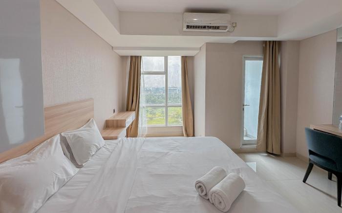 Modern Studio Grand Sungkono Lagoon By Travelio