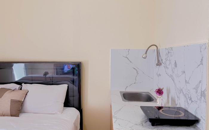 Nice Studio Green Pramuka City Apt By Travelio