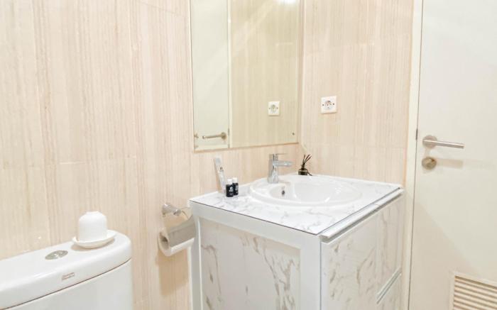 Warm Cozy 1BR at Sentul Tower Apt By Travelio