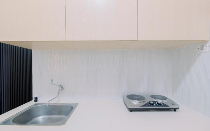 Restful Modern 2BR at Sentul Tower Apt By Travelio