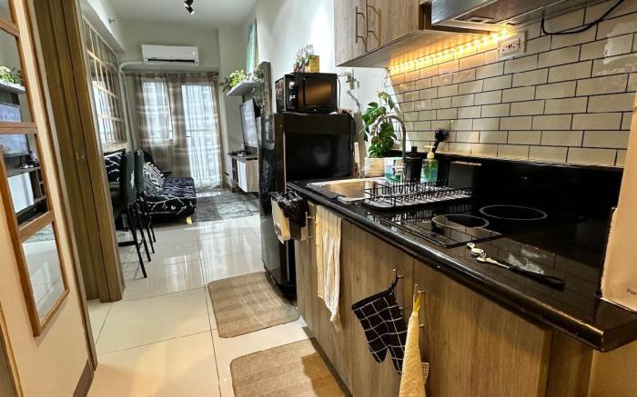 Reigh & Reign 2058 1BR  @Coast Residences