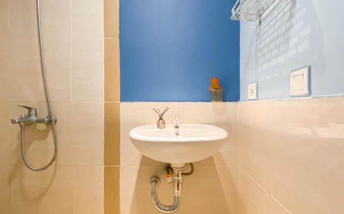 Spacious Cozy 2BR at Apt Meikarta By Travelio