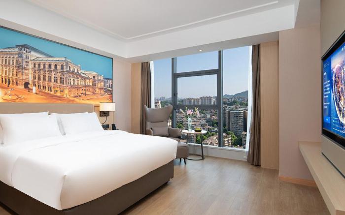 Vienna International Hotel 5.0 Guiyang Huaxi District Government Mingzhu Avenue Metro Station