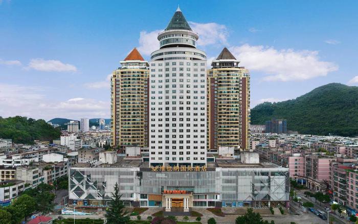 Vienna International Hotel Xingyi Wanfenglin Airport Pingdong Plaza