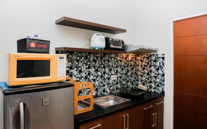 Best Price 2BR @ Taman Melati Margonda By Travelio