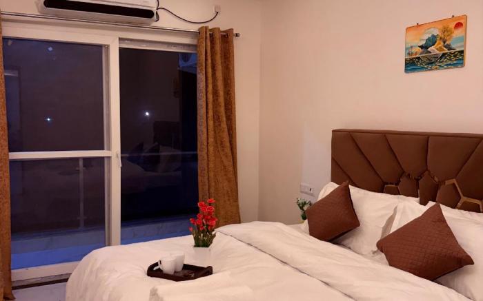 Ganga Nest | Cosy 2 BHK with Ganga View