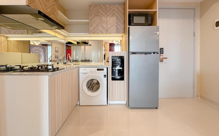 Contemporary 2BR Grand Sungkono Lagoon By Travelio