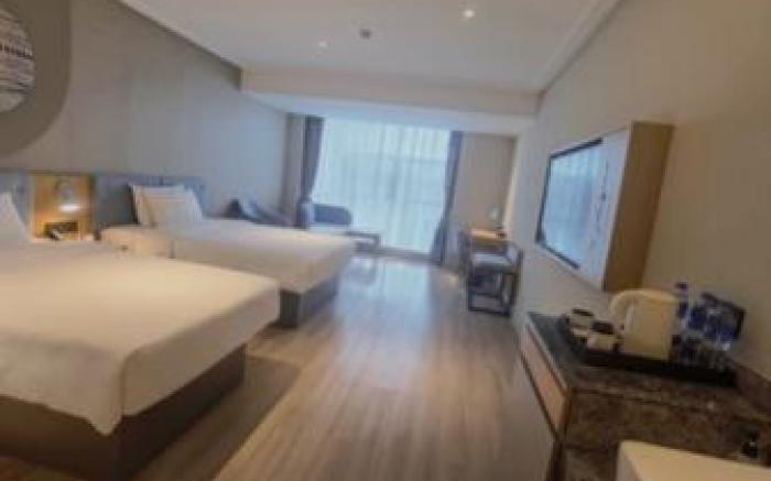 Home Inn Neo Cangxi Binjiang Road High-speed Railway Station