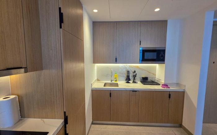 Elegant 1BR with Balcony PearlHouse Luxury Living!