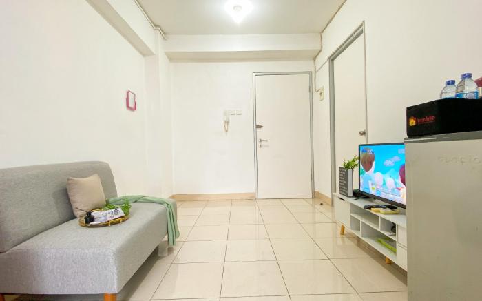 Homey Modern 2BR Green Bay Pluit Apt By Travelio