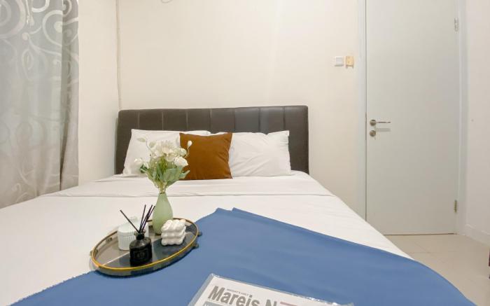 Good Place 2BR Green Pramuka City Apt By Travelio