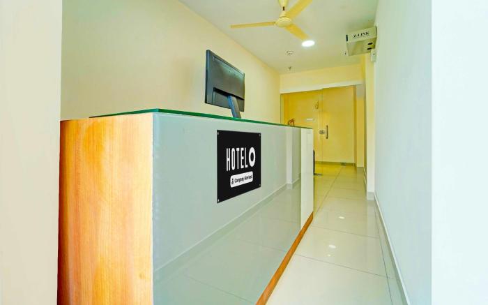Hotel O Kureepuzha Kollam