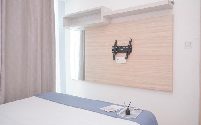 Modern Look 2BR Apt Tree Park City BSD By Travelio