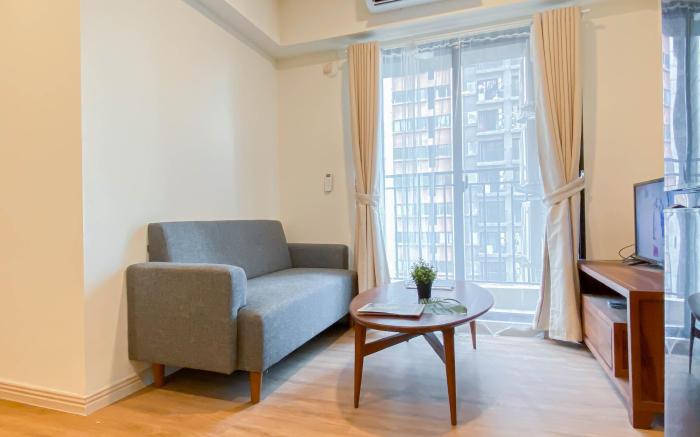 Warm 1BR with Makeup Room at Meikarta By Travelio