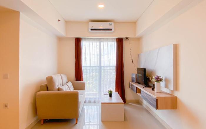 Restful 3BR at Meikarta Apartment By Travelio