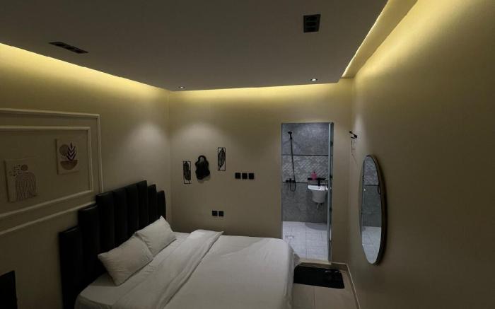 Self check-in studio with a comfortable bed