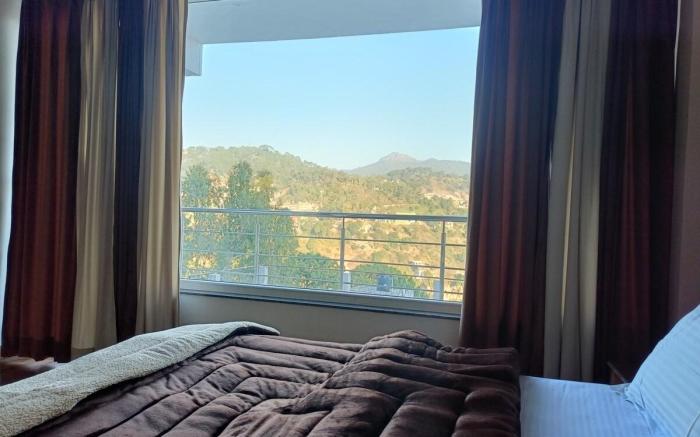 Sun Rise View
Twin Oaks 
kasauli Hills