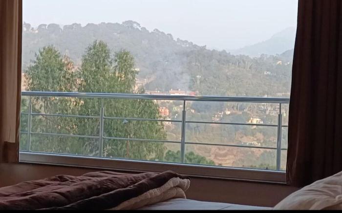 Sun Rise View
Twin Oaks 
kasauli Hills