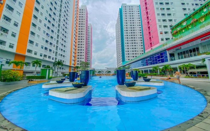 Compact 2BR Apt at Green Pramuka City By Travelio