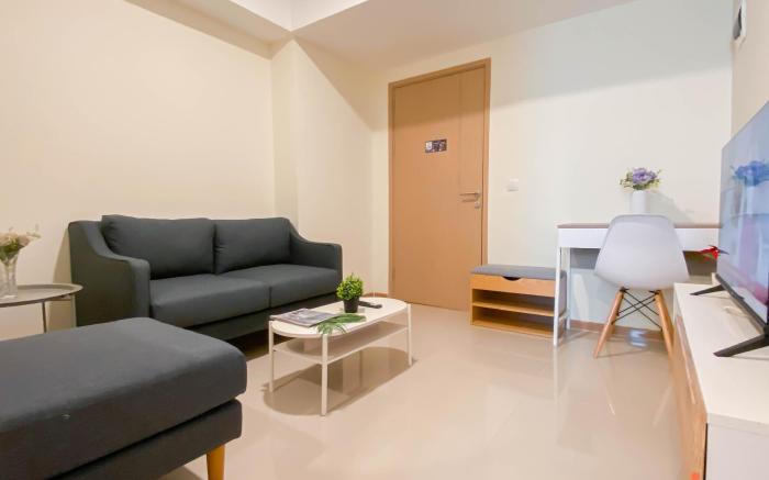 Modern 2BR at Meikarta Apt near AEON By Travelio