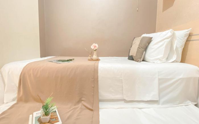 Simple Style 2BR at Green Pramuka City By Travelio