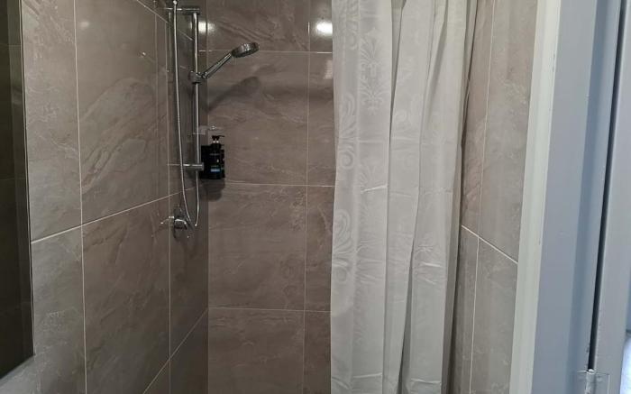 Three Double, 4 Single, 2 Sofa Bed, Suite 1