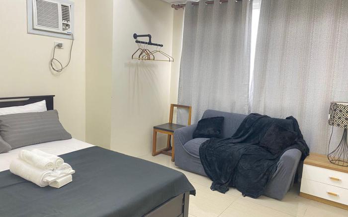 Cozy Room in Modern Paraaque Condo with 2 Bedrooms